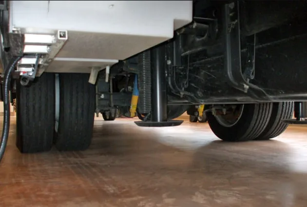 Scott Marlins repairing an RV leveling jack in Jensen Beach